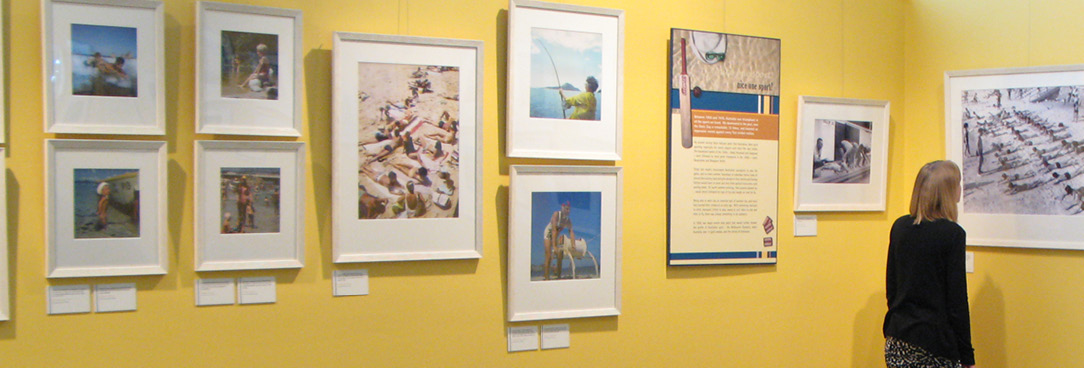 colour photo of someone looking at an exhibition display 